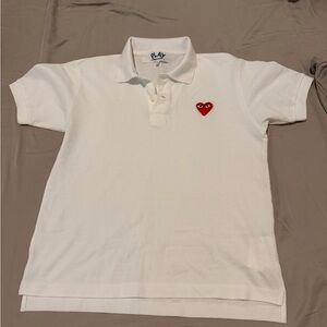 Like New Comme Des Garçons Play
Heart-patch piqué polo shirt